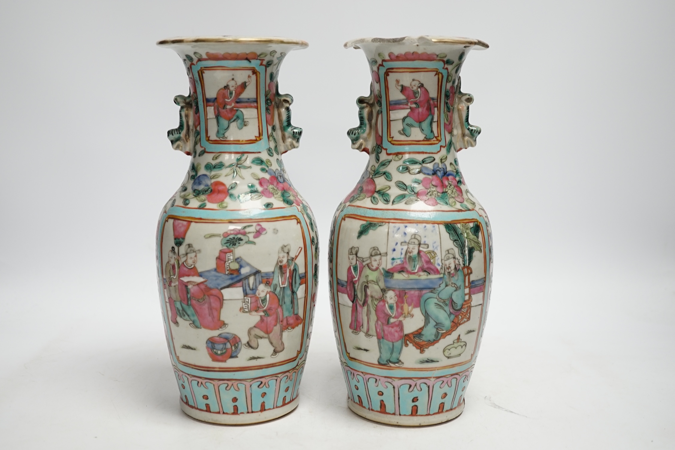 A pair of 19th century Chinese famille rose vases, 25cm high